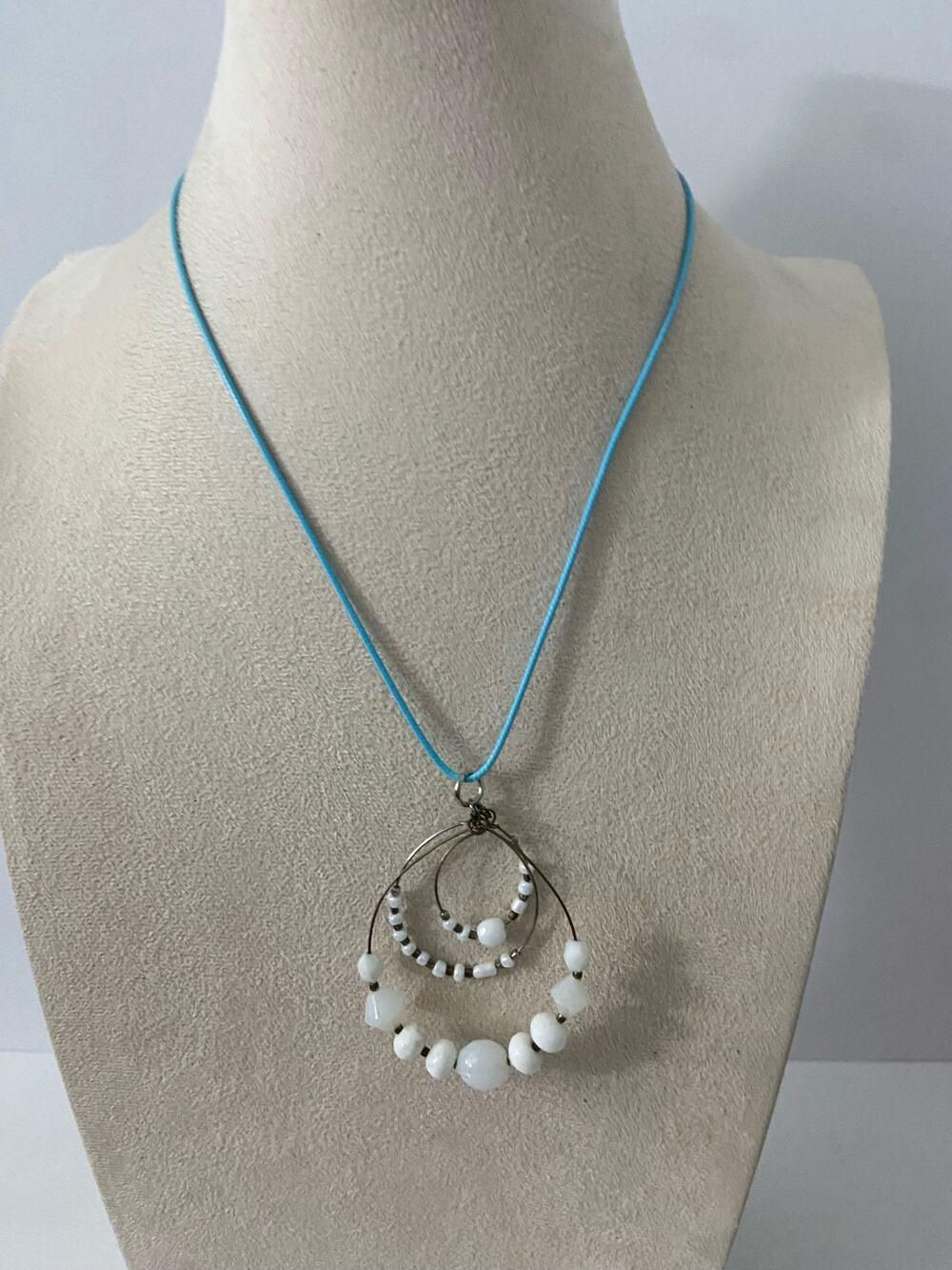 white bead pendant necklace